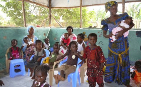 While students of the secondary school are in class, their children are taken care of by volunteers.