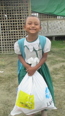 One happy student with her education kit.