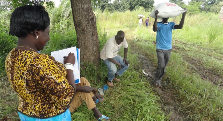 Keeping record while distributing food in Mundri in South Sudan.