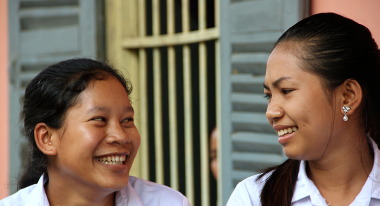 Lan Davin (left), 18, teaches English on the weekends to the children in her home town. Davin dreams of becoming a doctor or a teacher. For 16-year-old Prin Kaya (right), physics and chemistry are the favourite school subjects.
