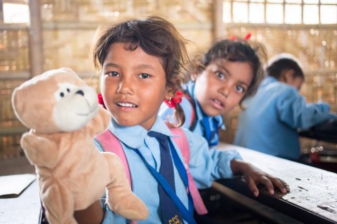 5-year-old Sajna Tamang is showing a puppet which is part of pre-school teaching material distributed by Unicef and Finn Church Aid.