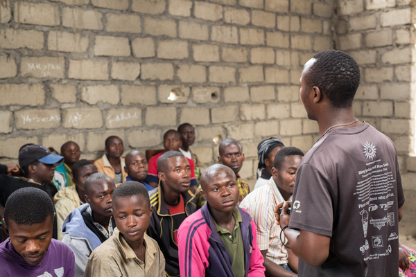 Former child soldier Heritier Nguma telling students about his life story in Masisi, Democatric Republic of Congo. Photo: Ville Asikainen