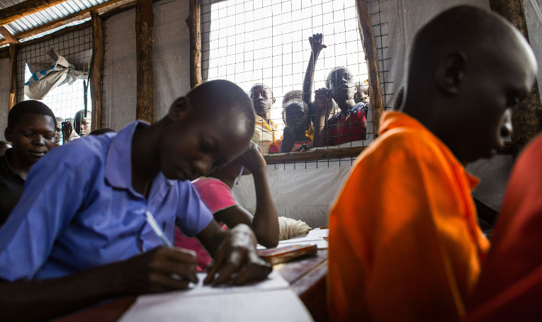Children learning at a refugee camp in Uganda at FCA's temporary school