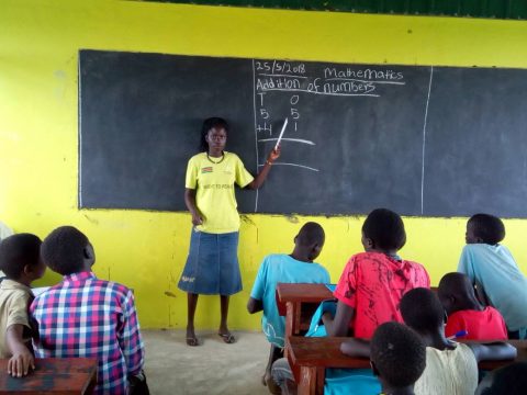 Stella Boyoi teaches mathematics to children in the newly built classroom. Photo: Kajasuk Jackson