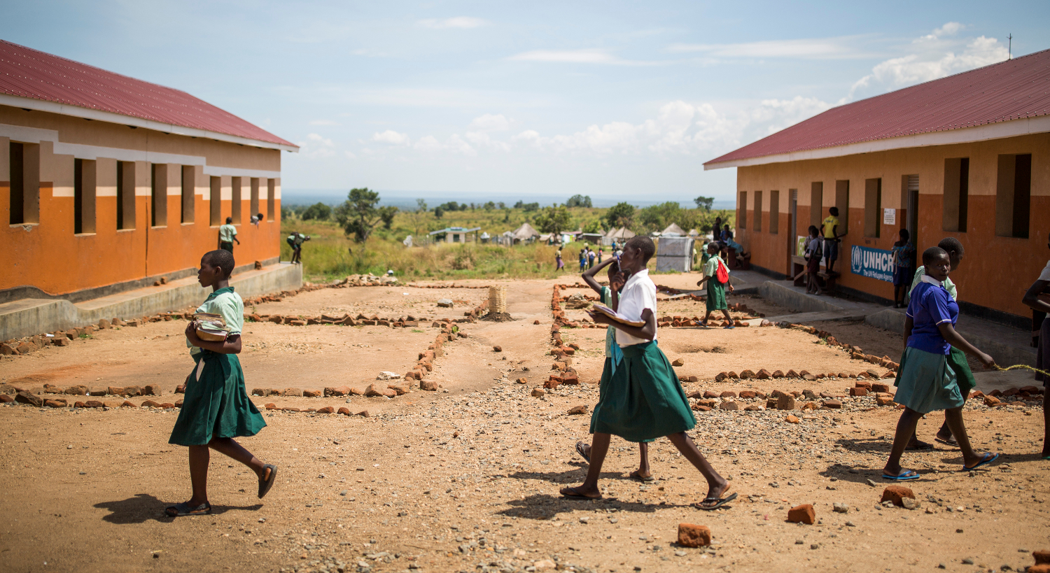 Girls attending Yoyo primary school going to classes at Bidibidi refugee settlement. 