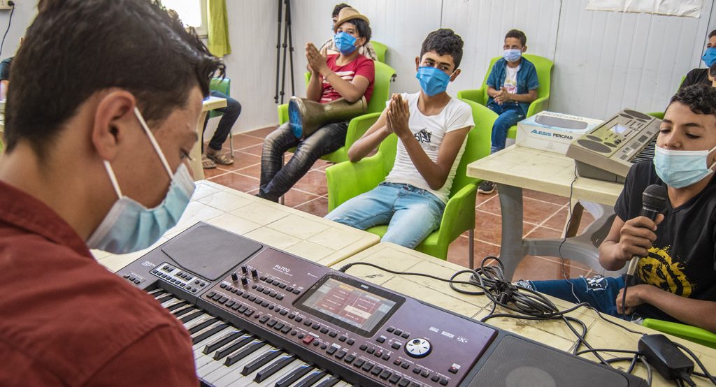 Music lessons are an important source of psychosocial support for Syrians in Zaatari refugee camp in Jordan. Photo: Wisam al-Riyabi