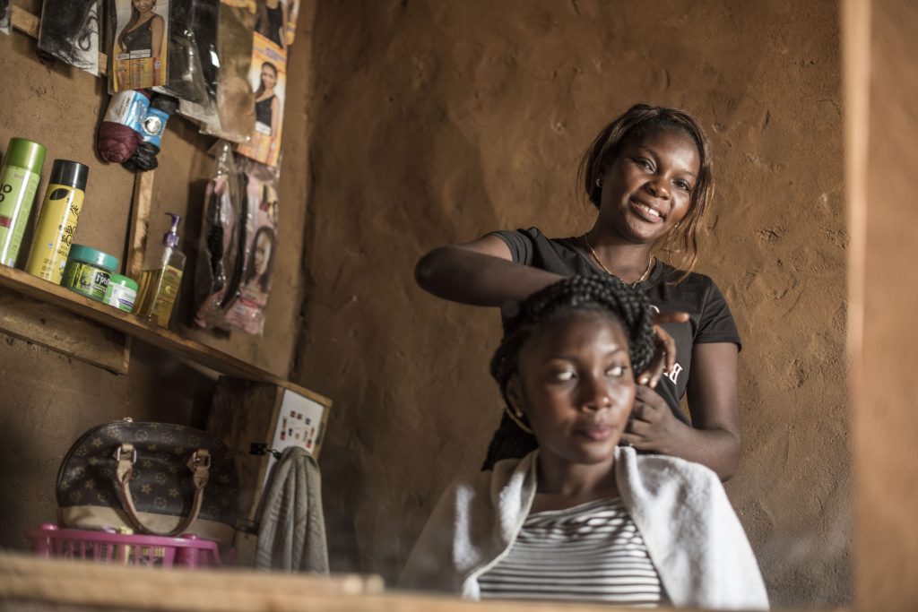 A hairdresser working.