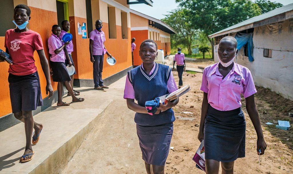 Girls walking to school in Uganda.