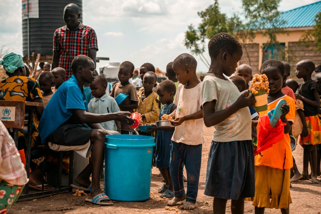 Children receiving a meal in a school