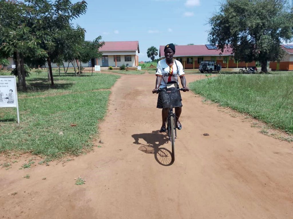 A refugee riding a bicycle