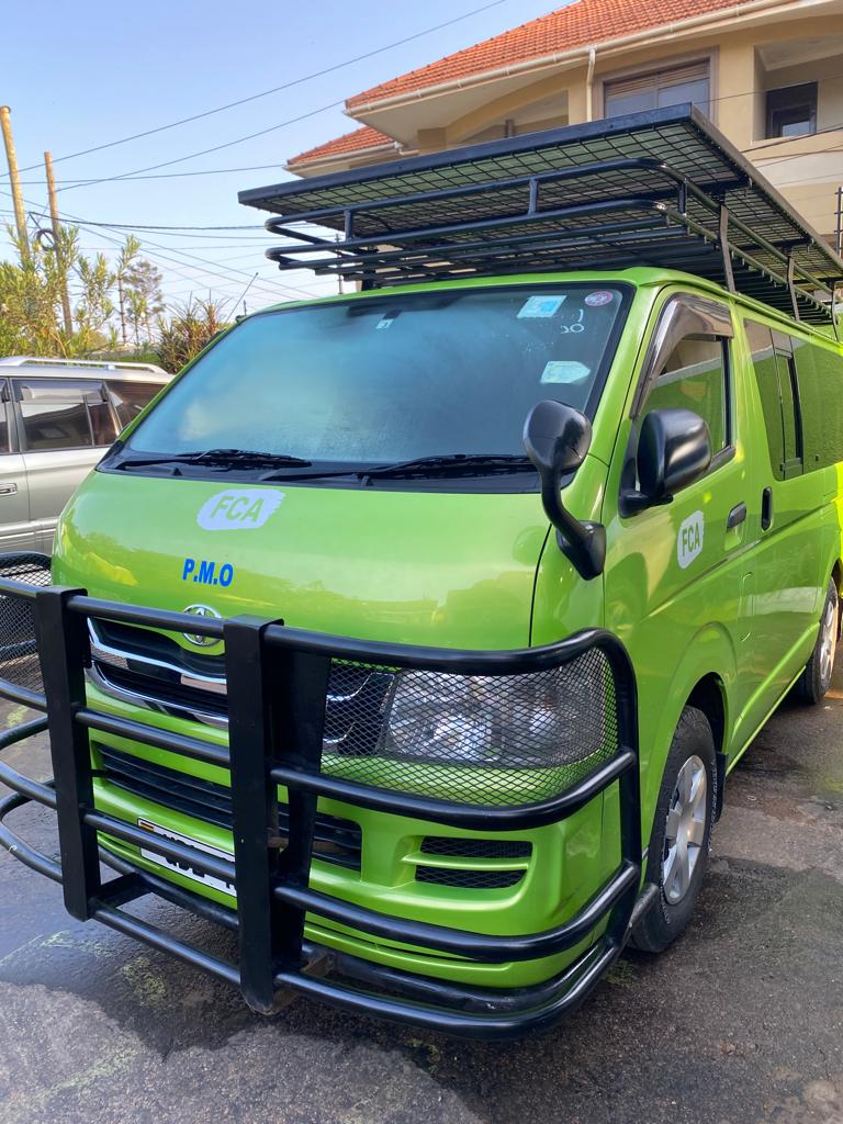 A green mini van