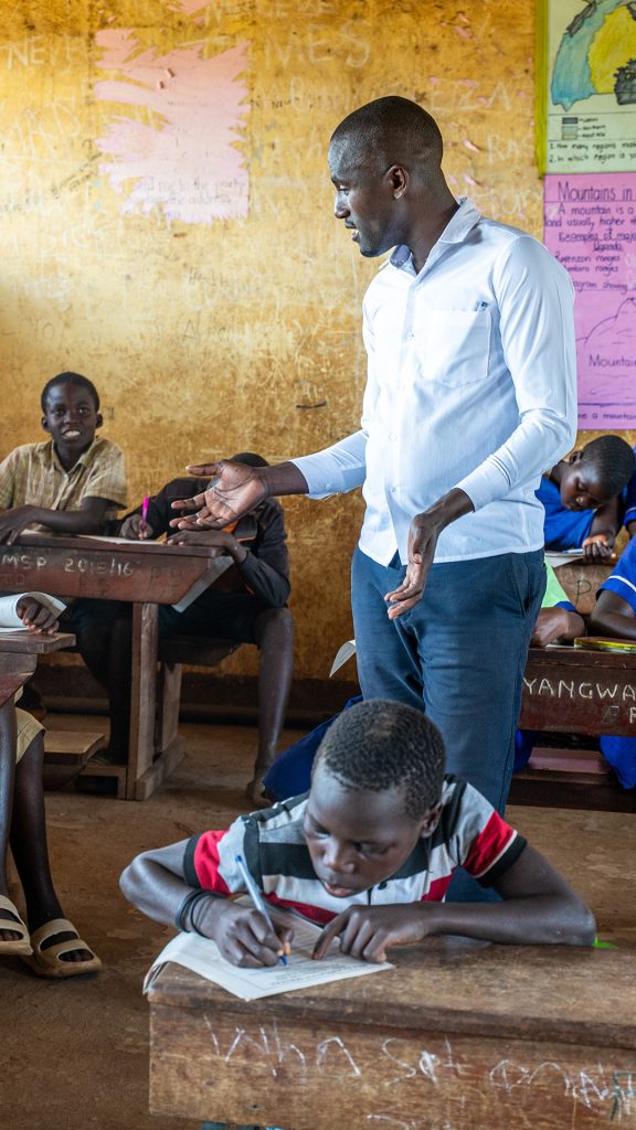 A teacher teaching in a classroom