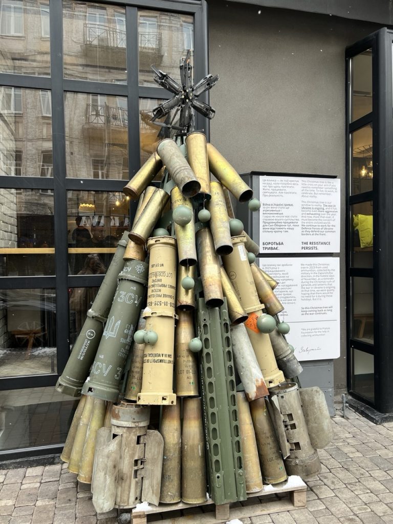 A sculpture of old artillery shells made to resemble a Christmas tree